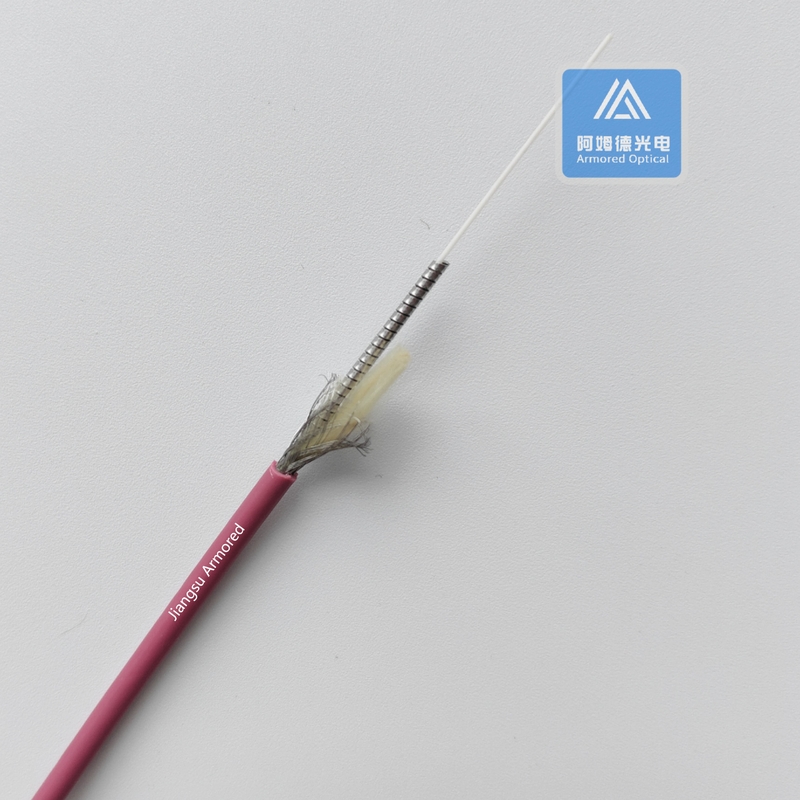 Simplex MM Spiral Armored Fiber Cable 3.0mm Red PVC Jacket Rodent Resistant FTTH With Braiding Mesh